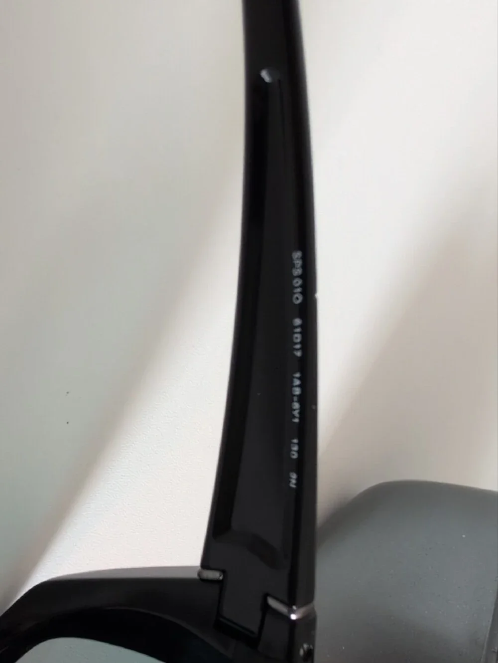 Prada Black Sunglasses with Red-Orange Mirrored Lenses